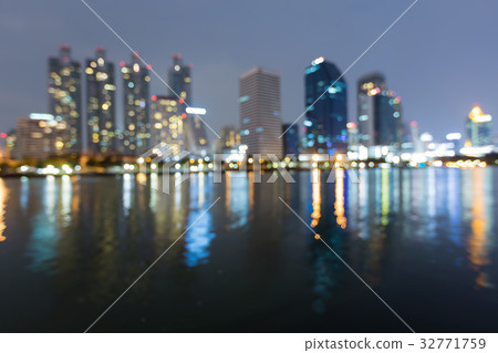 Office building blurred bokeh light night view 32771759