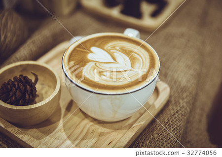 coffee latte art served on wood plate decorated coffee latte art served on wood plate decorated 32774056