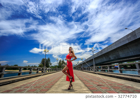 Young Woman Posing on The Sarasin Bridge Young Woman Posing on The Sarasin Bridge 32774710