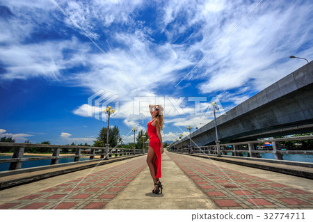 Young Woman Standing on The Sarasin Bridge Young Woman Standing on The Sarasin Bridge 32774711