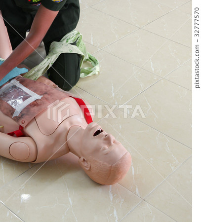 medical dummy receiving CPR refresher training medical dummy receiving CPR refresher training 32777570