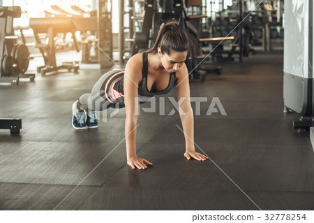 Young woman exercise in the gym healthy lifestyle Young woman exercise in the gym healthy lifestyle 32778254