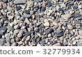 Rock on the beach texture background 32779934
