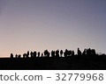 Silhouette of people looking at view against sky 32779968