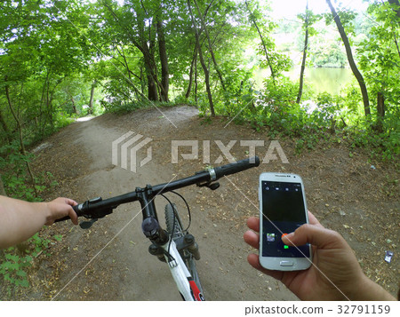 Bicycle steering wheel path forest trees 32791159