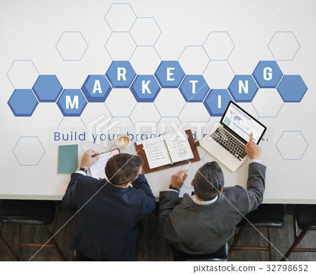 Workers working on laptop network graphic overlay table 32798652