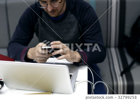 Man working on laptop networking technology Man working on laptop networking technology 32799258