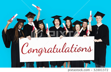 Diverse Students wearing Cap and Gown Showing Congratulations Sign Studio Portrait Diverse Students wearing Cap and Gown Showing Congratulations Sign Studio Portrait 32801372