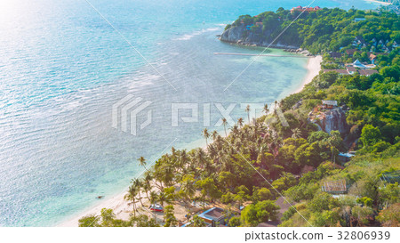 Tropical beach with palms on a windy day Tropical beach with palms on a windy day 32806939