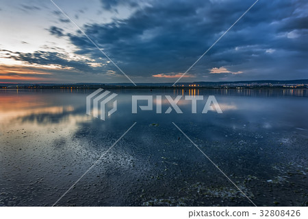 blue hour and city lights at horizon 32808426
