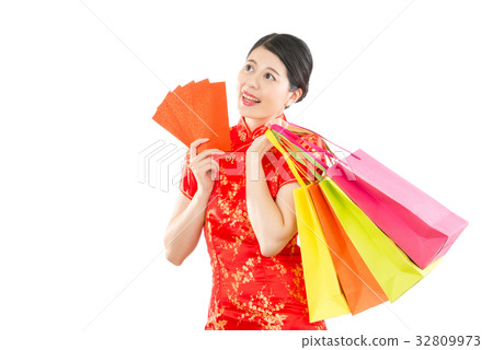 thinking woman holding bags and lucky money 32809973