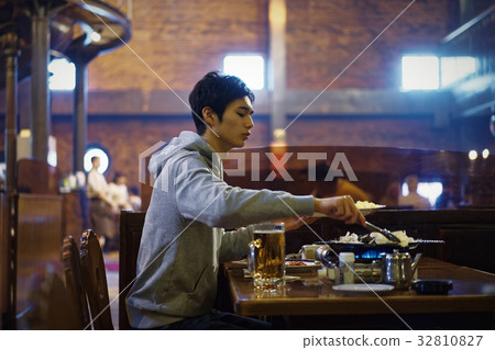 Men tasting Genghis Khan Men tasting Genghis Khan 32810827