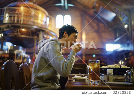 Men tasting Genghis Khan 32810838