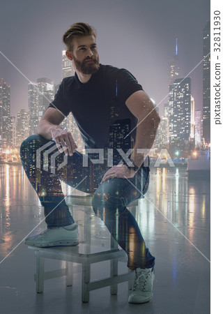 Dreamful young man relaxing near city view Dreamful young man relaxing near city view 32811930