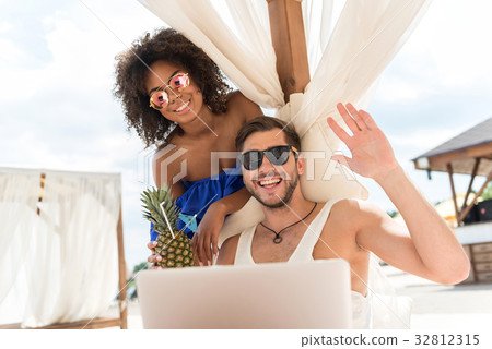 Happy youthful couple in love communicating 32812315