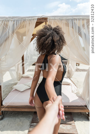Youthful african lady resting on summer resort Youthful african lady resting on summer resort 32812410