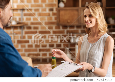 Gorgeous thankful lady providing her signature 32813908