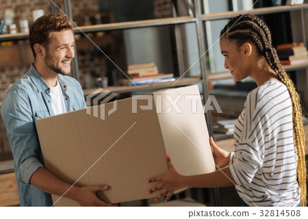 Positive delighted pair of loving people that 32814508