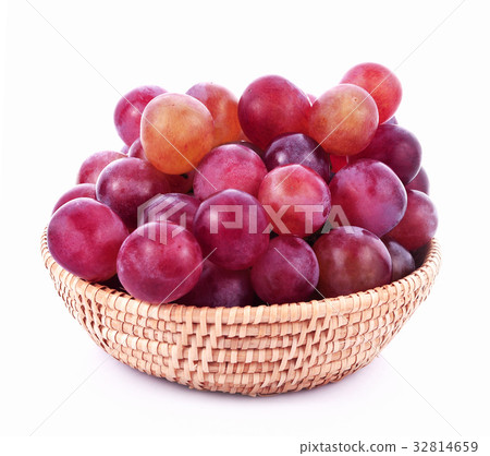 Red grapes in basket on white background Red grapes in basket on white background 32814659