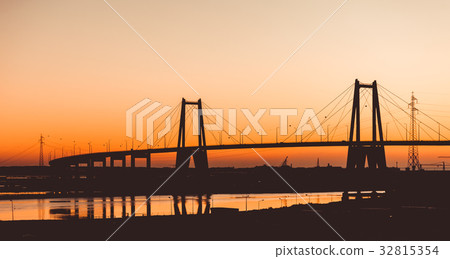Silhouette of a concrete bridge on a sunset 32815354