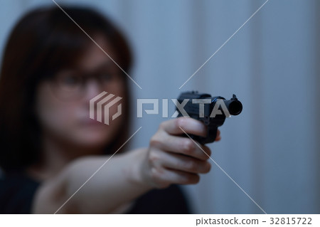 Pistol handgun (criminal illegal culprit villain disguise casualty case criminal suspicious intruder gang) 32815722