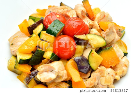 Stir-fried summer vegetables and chicken thighs. Saute cherry tomatoes, zucchini, eggplant, paprika, and chicken with garlic spice. Stir-fried summer vegetables and chicken thighs. Saute cherry tomatoes, zucchini, eggplant, paprika, and chicken with garlic spice. 32815817