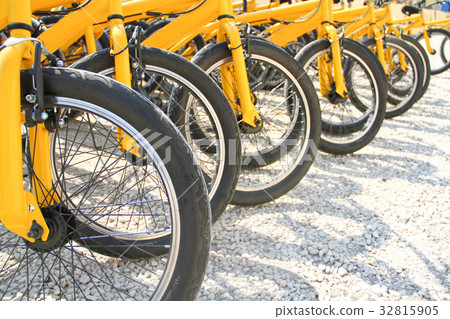Wheel detail of a group of bikes 32815905