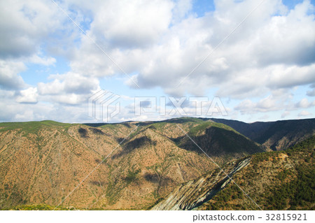 mountain landscape with blue sky and white clouds 32815921