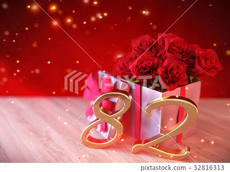 birthday concept with red roses in gift on wooden 32816313