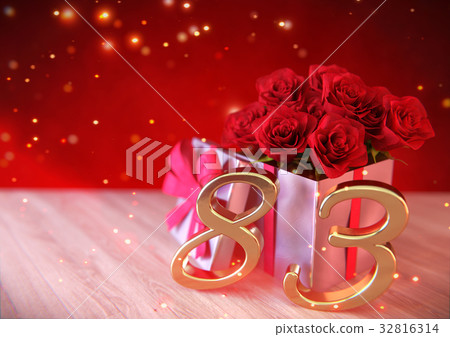 birthday concept with red roses in gift on wooden 32816314