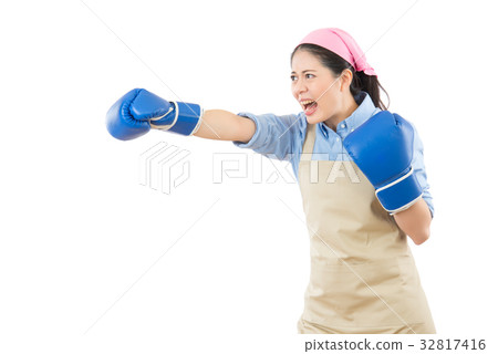 crazy house wife punching with boxing gloves crazy house wife punching with boxing gloves 32817416