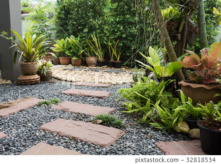 Simple pathway in home garden landscape Simple pathway in home garden landscape 32818534