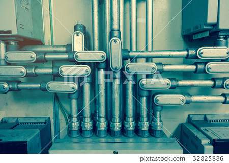 Electrical Conduit connected to junction box  32825886