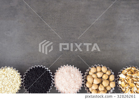 Various superfoods on gray table Various superfoods on gray table 32826261