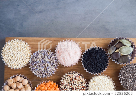 Various superfoods on gray table 32826263