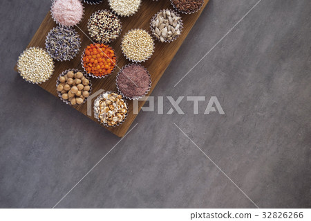 Various superfoods on gray table 32826266
