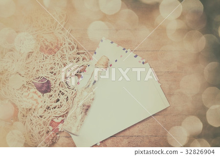Net, envelopes and shells with bottle 32826904