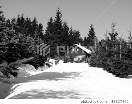 Small mountain hut in winter time Small mountain hut in winter time 32827831
