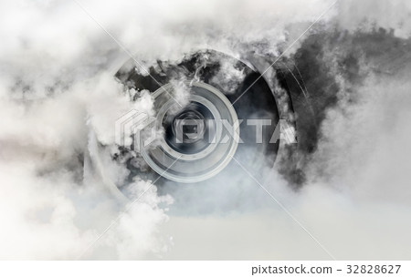 Drag racing car burns rubber off its tires in preparation for th Drag racing car burns rubber off its tires in preparation for th 32828627