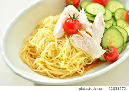 A simple summer 'Cold Chinese' style served. Sliced cucumber, chicken breast meat boiled, served with mini tomato. 32831373