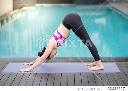Young Asian woman doing yoga exercise 32832337