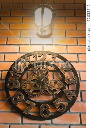 Vintage wall clock on brick room Vintage wall clock on brick room 32835341