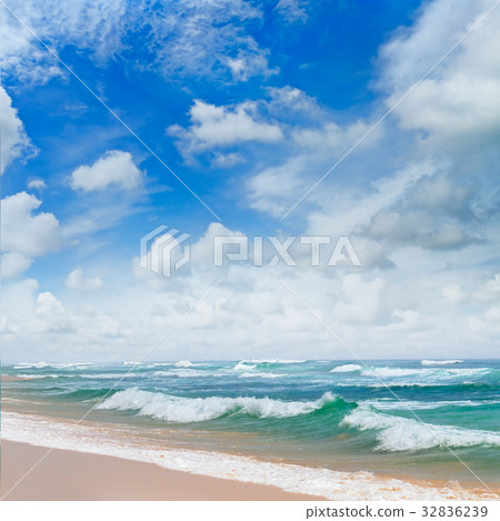 ocean, sandy beach and blue sky 32836239