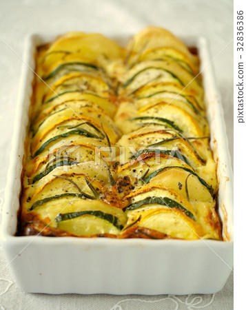 Zucchini and potato, rosemary flan (vertical position) 32836386