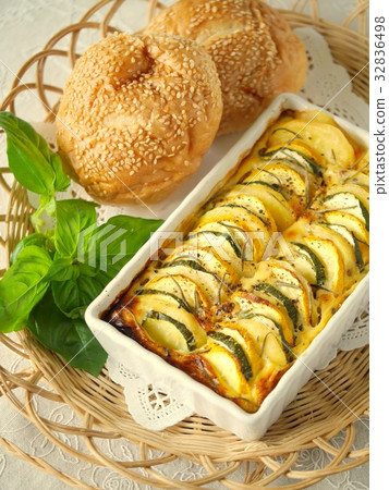Zucchini and potatoes with rosemary flannel (high angle) Zucchini and potatoes with rosemary flannel (high angle) 32836498