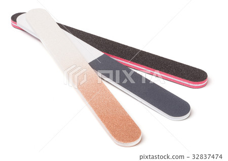Three nail file with a different abrasive isolated 32837474