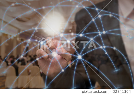 Businessman pointing with digital network line and circles on Abstract blurred photo of conference hall or meeting room with attendee background, business technology concept Businessman pointing with digital network line and circles on Abstract blurred photo of conference hall or meeting room with attendee background, business technology concept 32841304