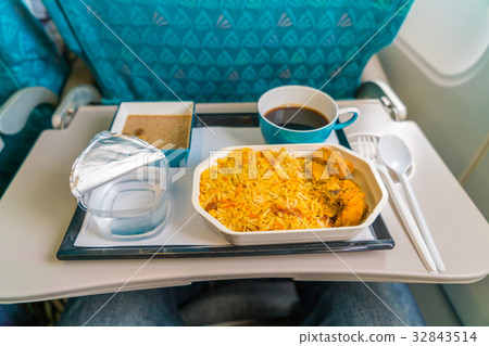 Healthy food on the plane with coffee . Healthy food on the plane with coffee . 32843514