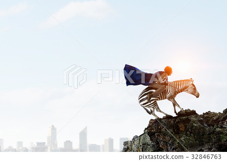 Businesswoman riding zebra. Mixed media 32846763