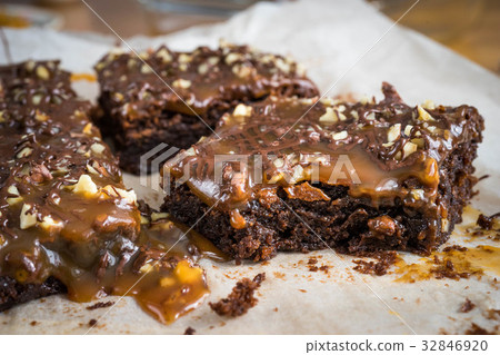 Brownies with nuts and salted caramel. Brownies with nuts and salted caramel. 32846920